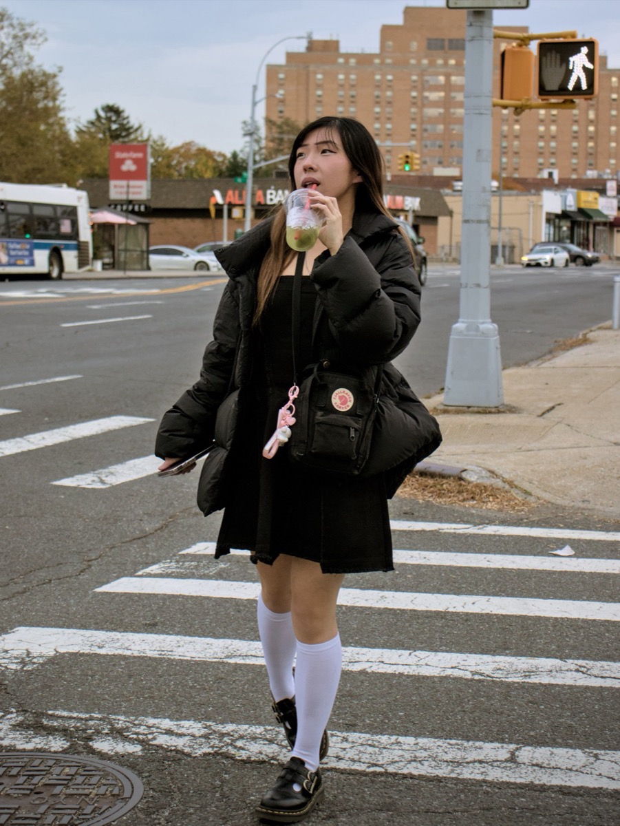 Akeizy crossing the street