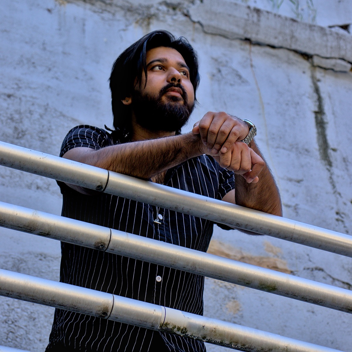 Dee looking off in the distance from below